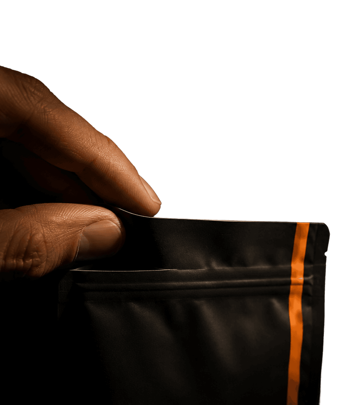 The corner of a State Coffee bag, its orange stripe catching the light.
