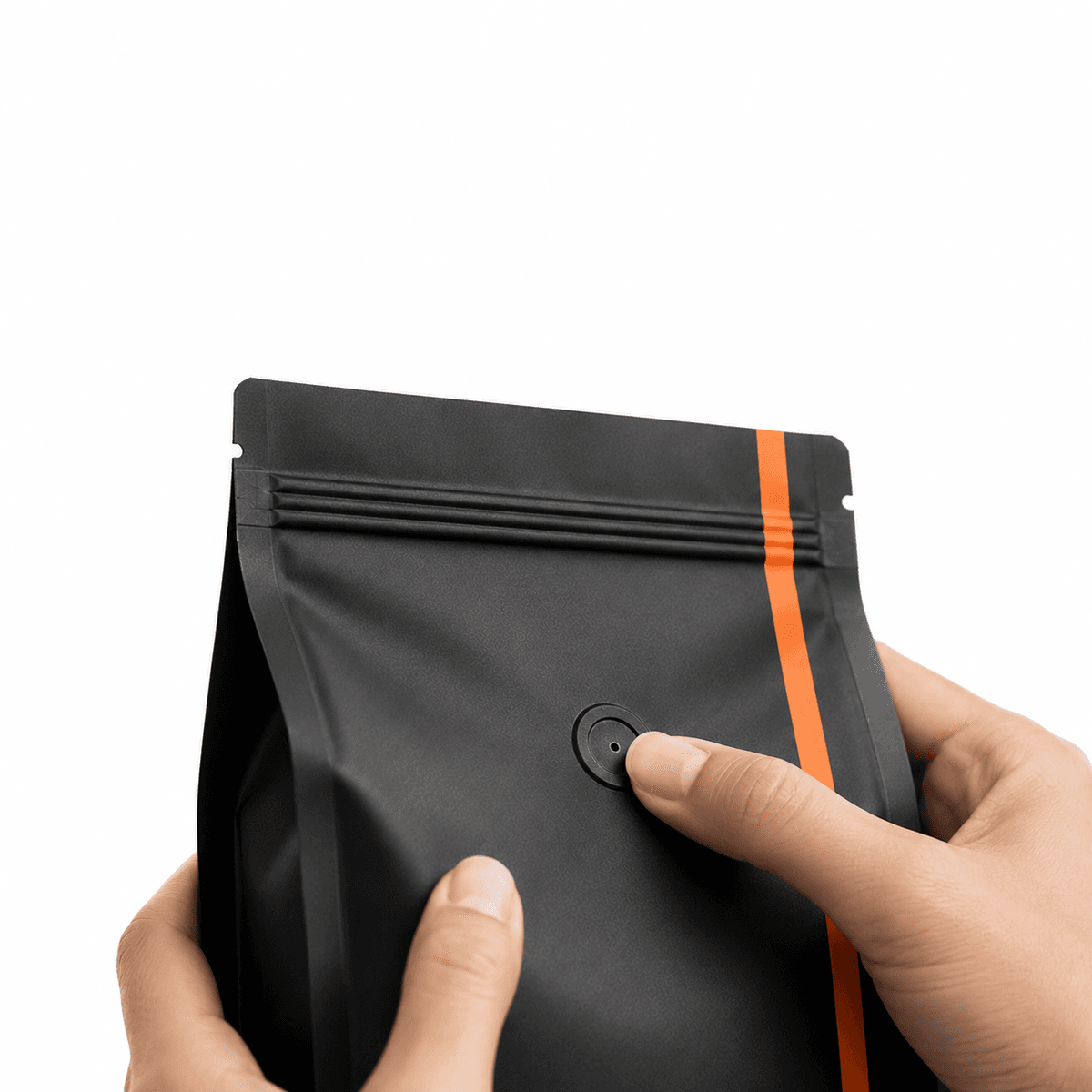 Hands sealing a State Coffee bag's freshness valve, the bag's orange stripe running down its side.