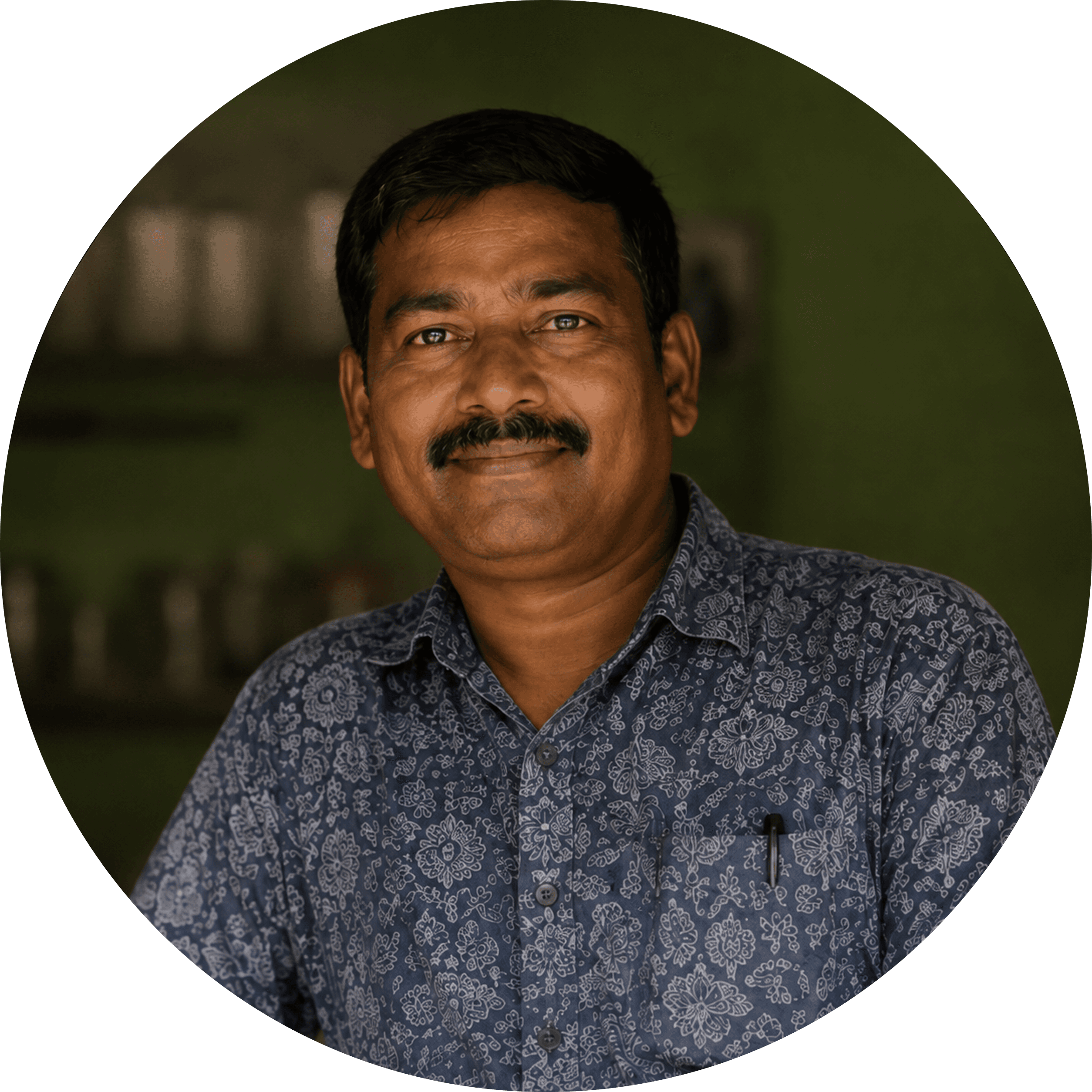 A portrait of the roaster at Shriram Roasters.